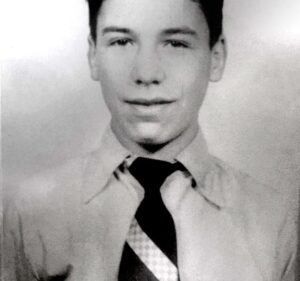 Young Ed Vivio in a shirt and tie.