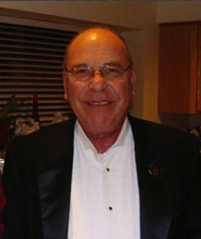 Ed Vivio wearing a tuxedo.