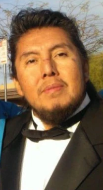 Headshot of Michael Clark wearing a tuxedo